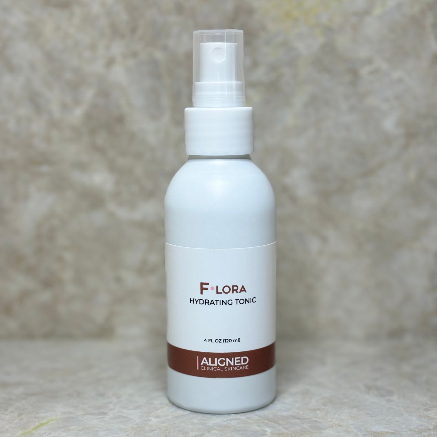 Flora Hydrating Tonic in white spray bottle
