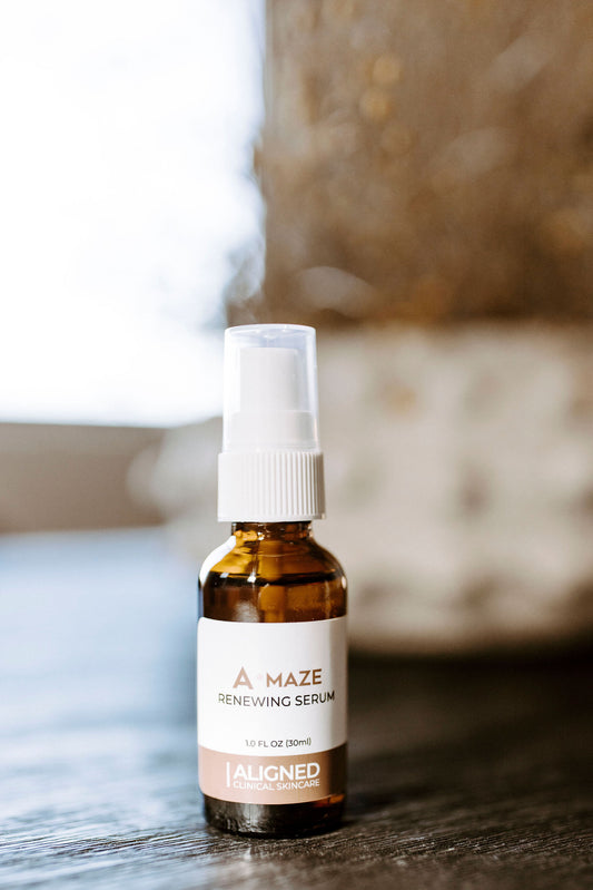 A-maze Renewing Serum in amber glass pump bottle