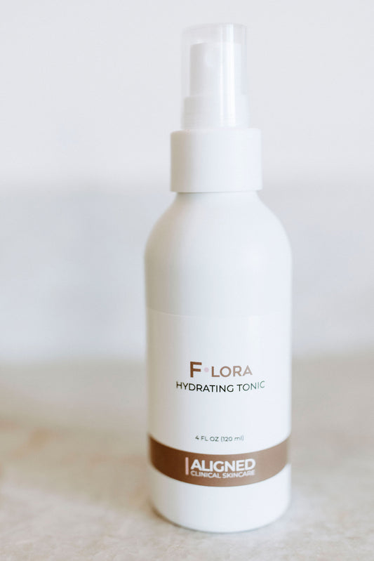 Flora Hydrating Tonic in white spray bottle