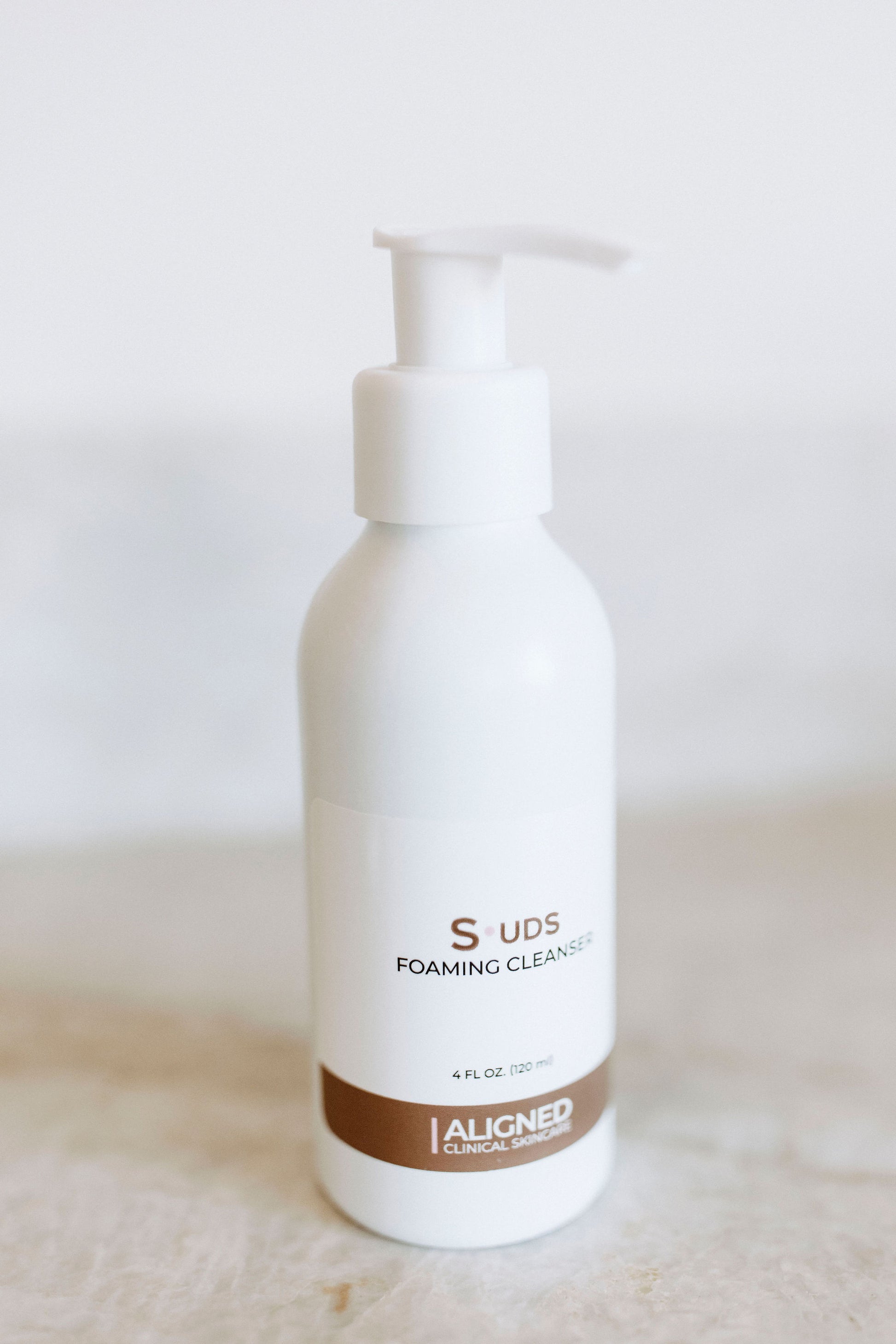 Suds Foaming Cleanser in white pump bottle