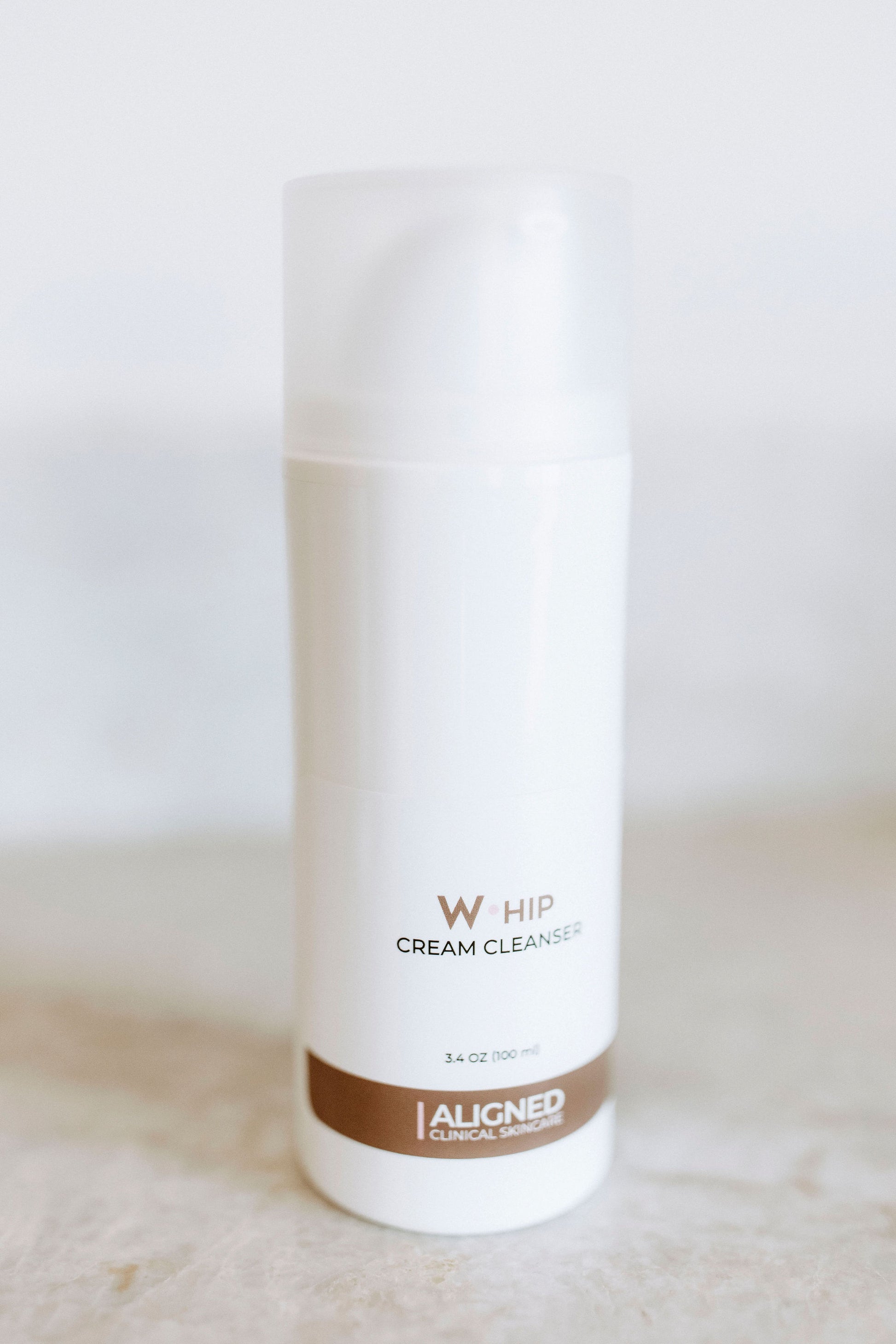 Whip Cream Cleanser in white pump bottle